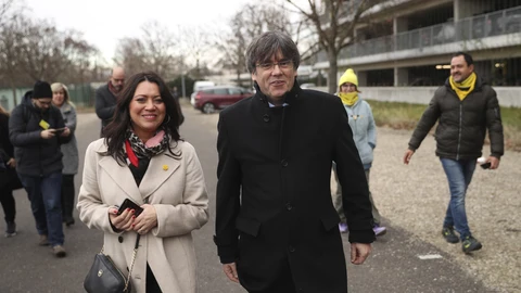 Catalonia's former regional president Carles Puigdemont, center right, and his wife Marcela Topor, center left, arrives at the European Parliament in Strasbourg, eastern France.