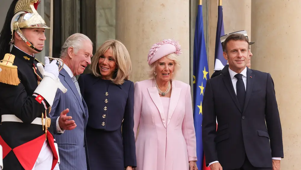 Britain's King Charles III (L), Queen Camilla (2-R), French President Emmanuel Macron (R) and First Lady Brigitte Macron (2-L) pose together at the Elysee Palace in Paris, France, 20 September 2023. The visit, initially planned for March and postponed because of unrests in France, leads the king and queen of Great Britain to Paris and Bordeaux and includes a state dinner, official appointments with President Macron and more informal meetings with French and British citizens