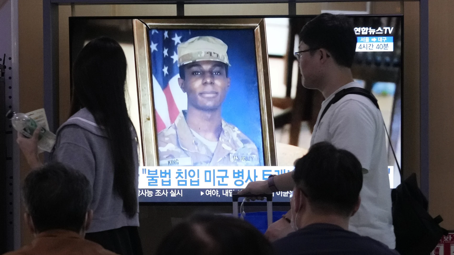 A TV screen shows a file image of American soldier Travis King during a news program at the Seoul Railway Station in Seoul, South Korea, Wednesday, Sept. 27, 2023. North Korea said Wednesday that it will expel King who crossed into the country through the heavily armed border between the Koreas in July. (AP Photo/Ahn Young-joon)