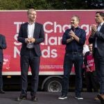 UK's Labour leader Sir Keir Starmer (C) with Scottish Labour leader Anas Sarwar (R) and the new Labour MP for Rutherglen and Hamilton West Michael Shanks (L) at a rally following Scottish Labour's win in Rutherglen and Hamilton West by-election. 