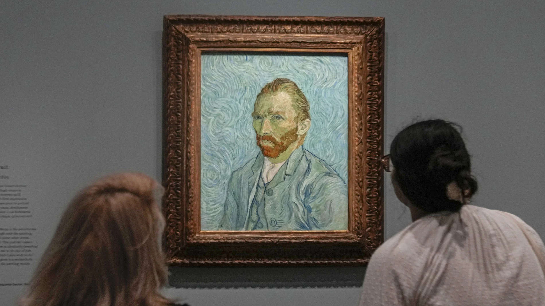 People look at Vincent Van Gogh's oil on canvas painting, Self-portrait, 1889, during the press day of the "Van Gogh in Auvers-sur-Oise: The Final Months" exhibition at the Musee d'Orsay in Paris, Friday, Sept. 29, 2023.