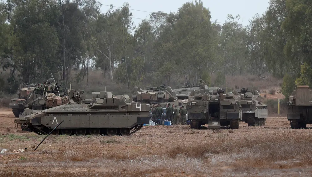 Israeli military tries to strengthen borders with Gaza as battle enters third day