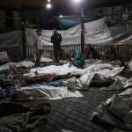 Palestinian Territories, Gaza City: Bodies oof Palestinians kille in an Israeli shelling on the Ahli Arab hospital, lie at al-Shifa hospital in Gaza City. 