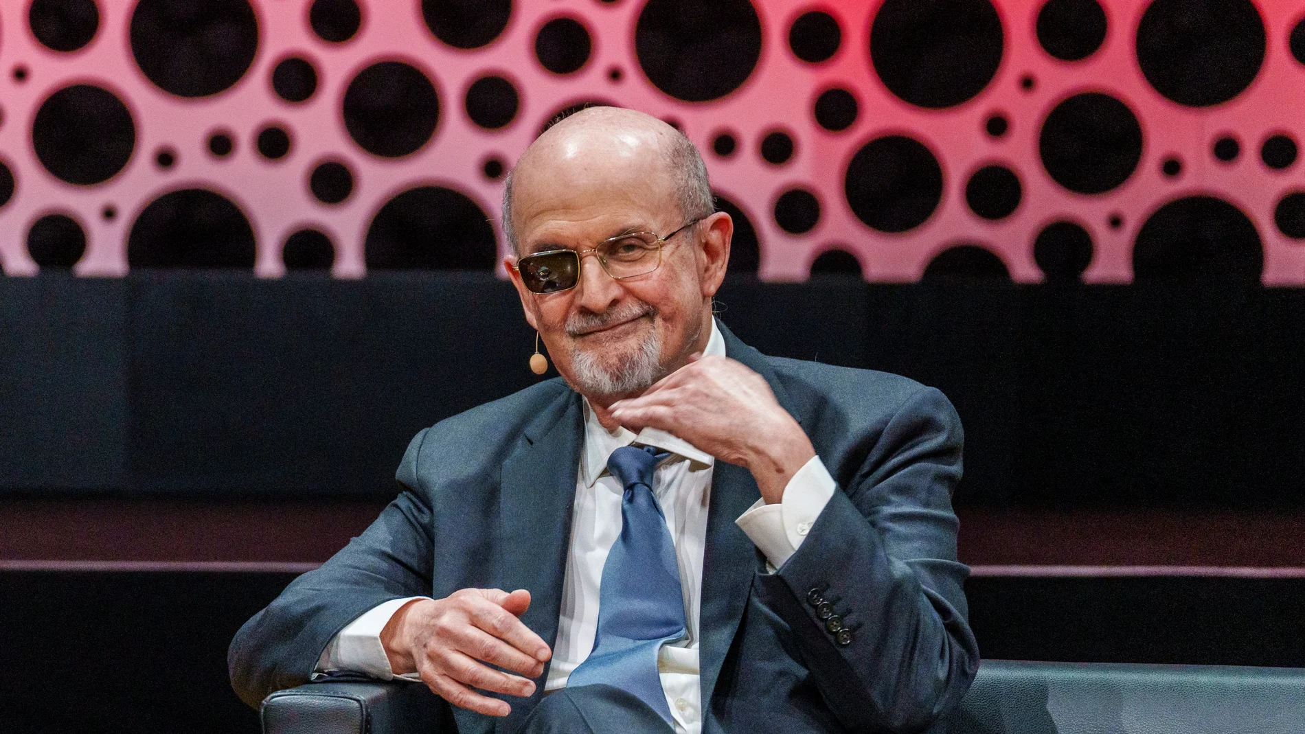 Author Salman Rushdie, winner of the Peace Prize of the German Book Trade 2023, sits on stage at the Literature Talk, in Frankfurt, Germany, Saturday, Oct 21, 2023. (Andreas Arnold/dpa via AP)