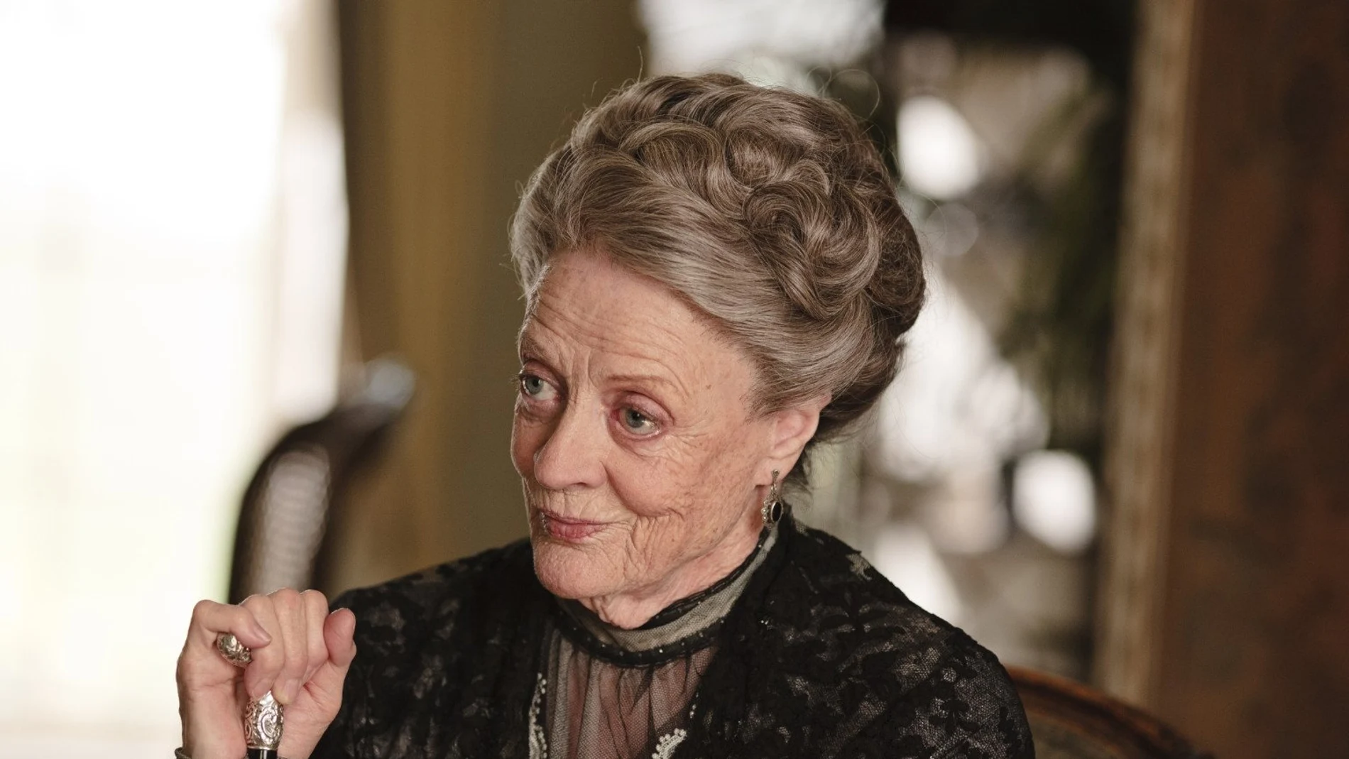 In this image released by PBS, Maggie Smith as the Dowager Countess is shown in a scene from the second season on "Downton Abbey." 
