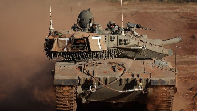 Israeli tanks maneuver along Lebanon border