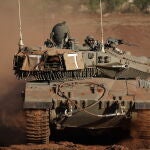Israeli tanks maneuver along Lebanon border