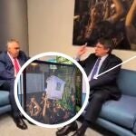 AMP.- Cerdán y Puigdemont se reúnen en una sala con una foto de una urna del 1-O, retirada por el Parlamento Europeo