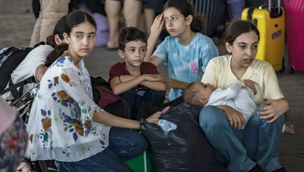 Rafah border crossing between Gaza and Egypt opens to allow limited evacuations