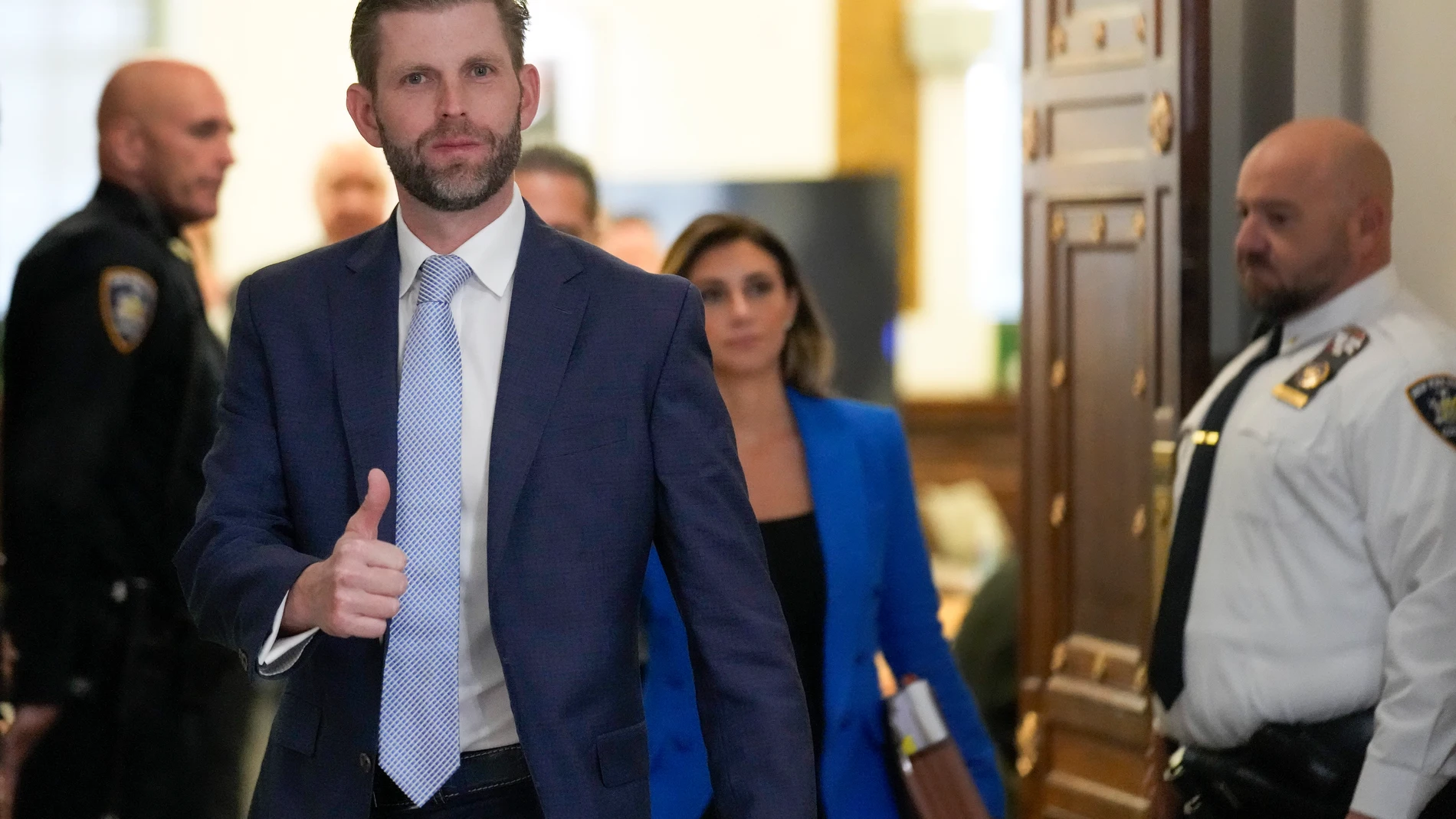 Eric Trump steps out of the courtroom during a break in proceedings at New York Supreme Court, Thursday, Nov. 2, 2023, in New York. (AP Photo/Seth Wenig)
