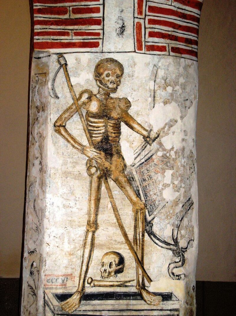 Pintura de la muerte con su guadaña en la iglesia de Santa Eulalia de Villacintor