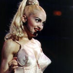 Madonna performs during her "Blonde Ambition" tour, in Philadelphia. 