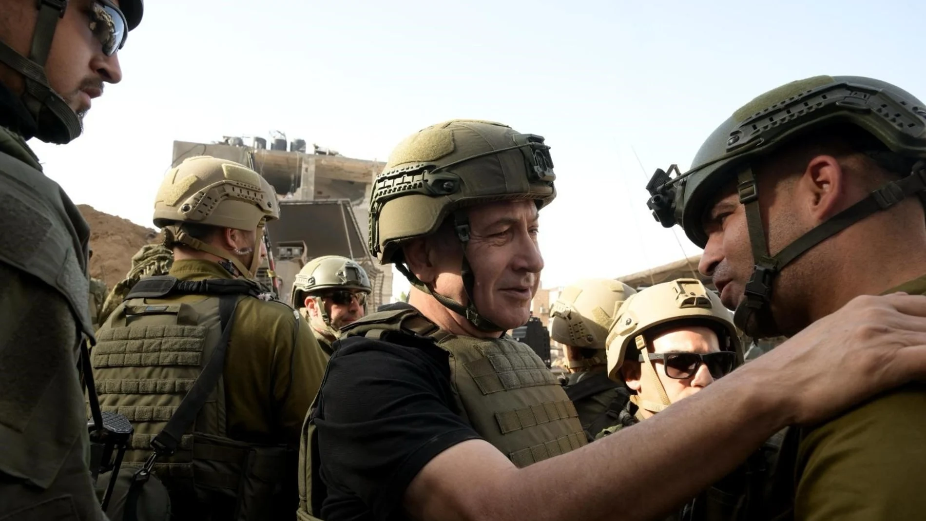 Israeli Prime Minister Benjamin Netanyahu meets with Israeli troops during a visit to the Gaza Strip on day three of the Truce between Israel and Hamas.