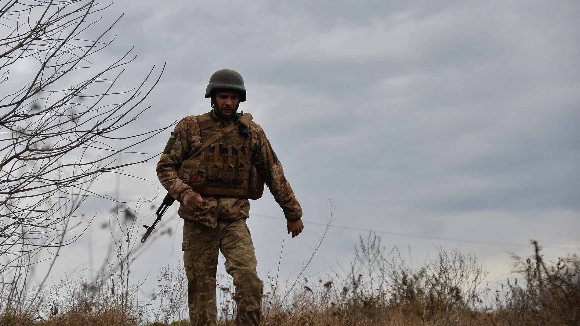 November 26, 2023, Kyiv, Donetsk, Ukraine: A Ukrainian soldier returns to his position following a completed fire mission. Soldiers with the 56th brigade continue to work in the Bakhmut region as winter approaches. 26/11/2023