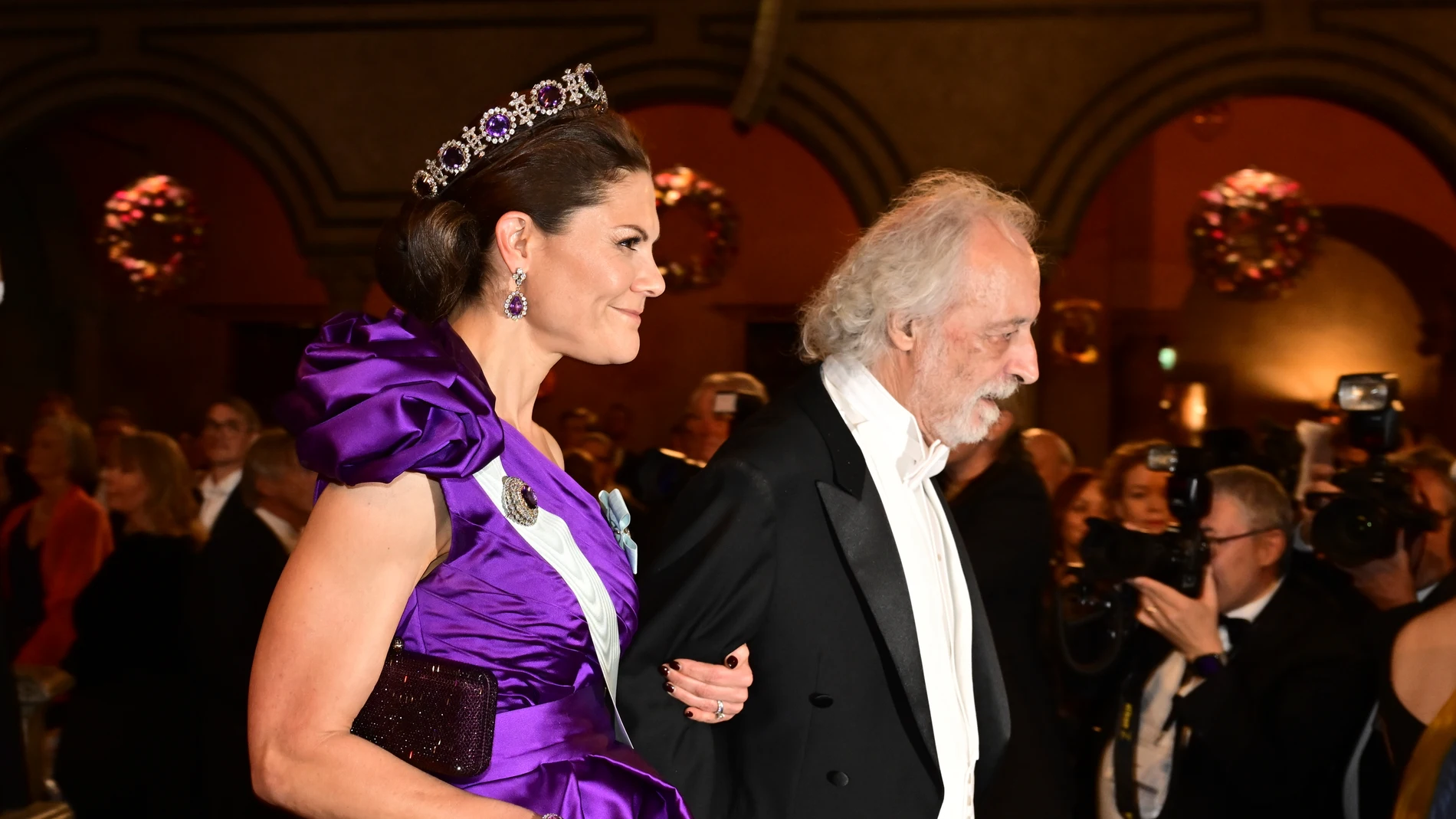 Crown Princess Victoria and Pierre Agostini, emeritus professor, laureate in physics 2023, during the Nobel banquet at the City Hall, Sunday, Dec. 10, 2023, in Stockholm. (Jonas Ekströmer/TT News Agency via AP)