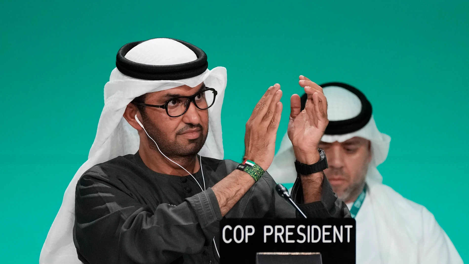 COP28 President Sultan al-Jaber claps during a plenary stocktaking session at the COP28 U.N. Climate Summit, Monday, Dec. 11, 2023, in Dubai, United Arab Emirates. (AP Photo/Rafiq Maqbool)
