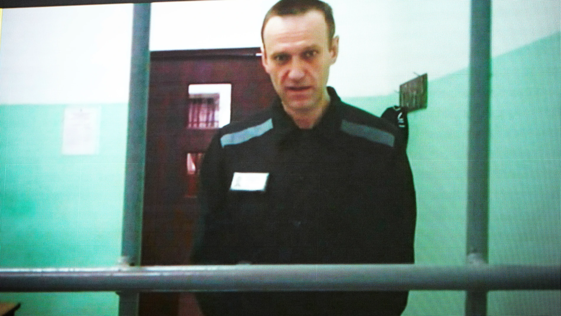 FILE - Russian opposition leader Alexei Navalny is seen on a TV screen as he appears in a video link provided by the Russian Federal Penitentiary Service from the colony in Melekhovo, Vladimir region, during a hearing at the Russian Supreme Court in Moscow, Russia, on June 22, 2023. The Kremlin on Tuesday Dec. 12, 2023 bristled at the U.S. voicing concern about Navalny who has vanished from his prison colony, denouncing it as “inadmissible interference” in the country's domestic affairs. Worr...