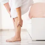 Mujer dolor piernas