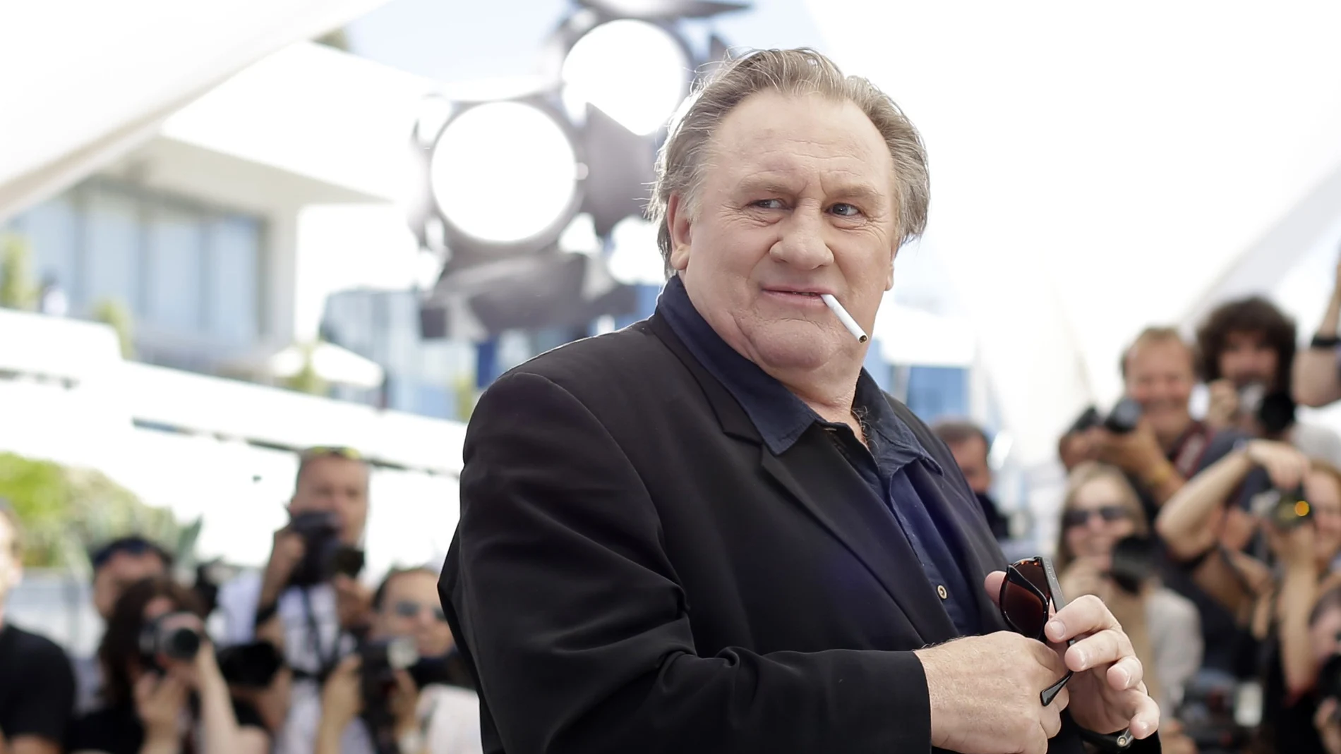 Actor Gerard Depardieu poses for photographers during a photo call for the film Valley of Love, at the 68th international film festival, Cannes