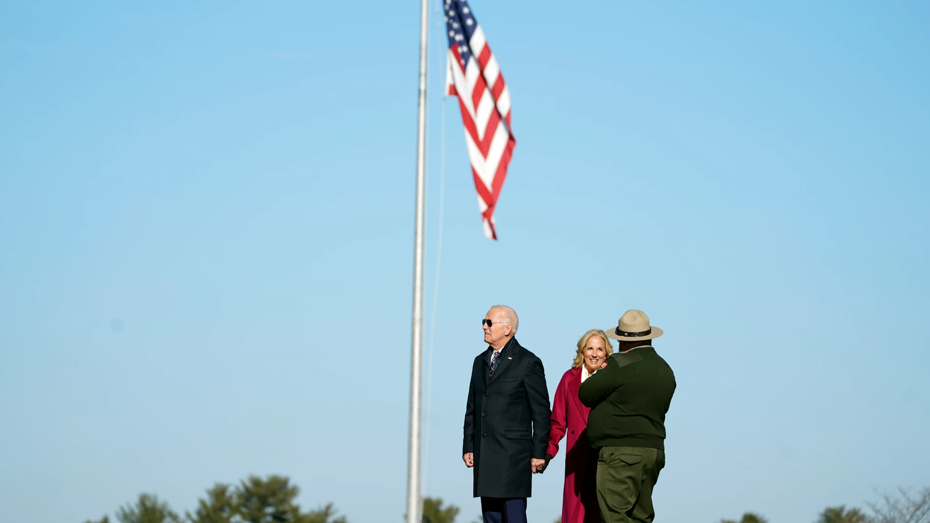 President Joe Biden and first lady Jill Biden participate in a memorial wreath ceremony at the National Memorial Arch at Valley Forge National Historic Park in Valley Forge, Pa., Friday, Dec. 5, 2024. (AP Photo/Stephanie Scarbrough)