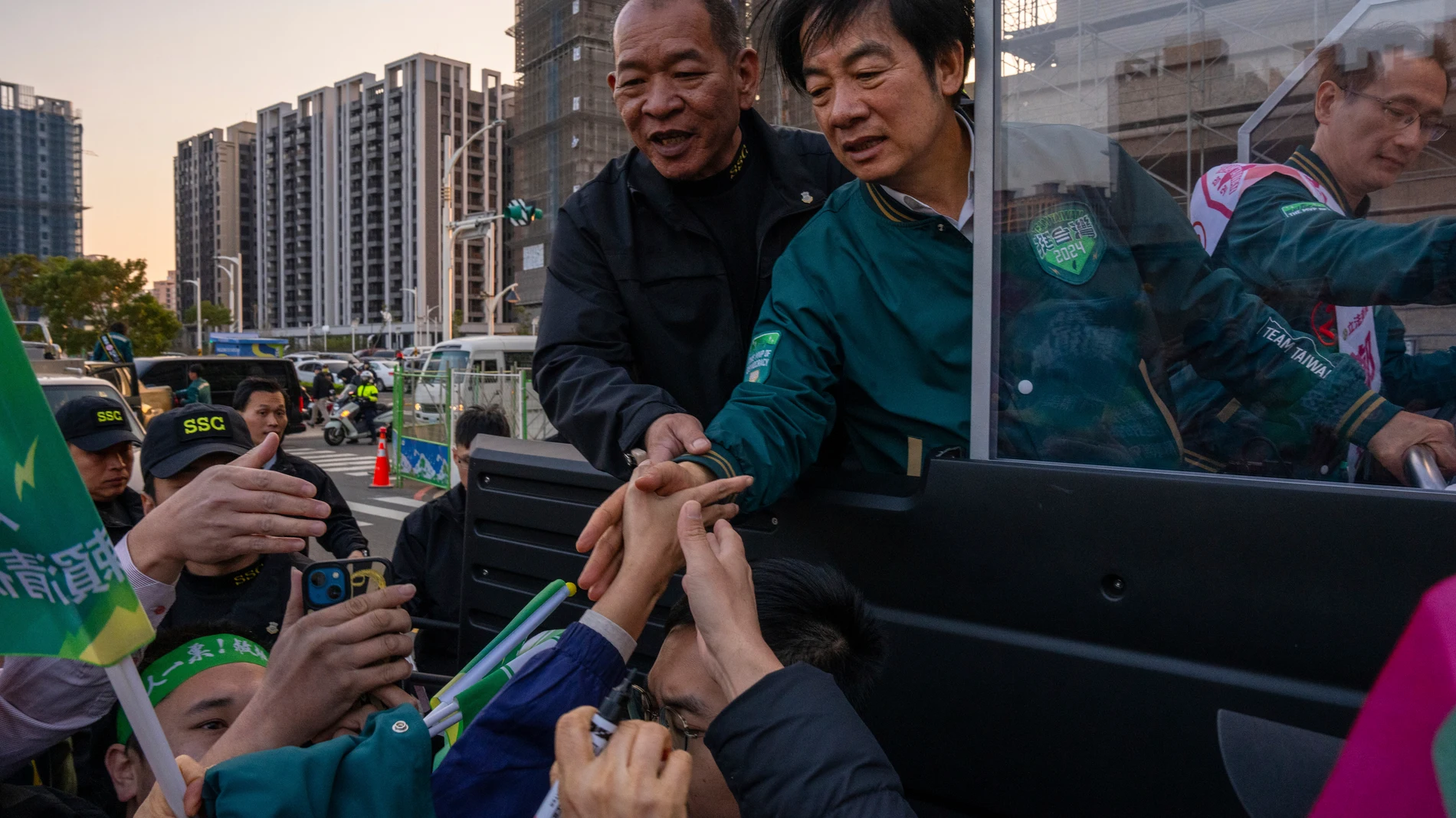 William Lai, Taiwan Democratic Progressive Party (DPP) presidential candidate is greeted by supporters during an election canvass of a neighbourhood in Taoyuan, Taiwan, on Thursday, Jan. 11, 2024, ahead of the presidential election on Saturday. (AP Photo/Louise Delmotte)