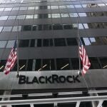 Flags fly on the front of BlackRock headquarters, Wednesday, Jan. 13, 2021, in New York.