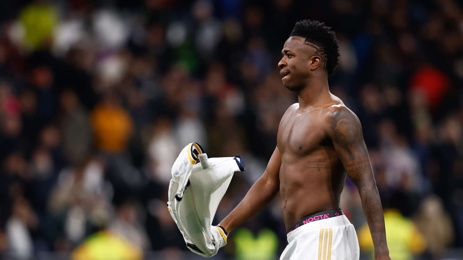 Vinicius Junior of Real Madrid walks without T-Shirt during the Spanish League, LaLiga EA Sports, football match played between Real Madrid and Girona CF at Santiago Bernabeu stadium on February 10, 2024 in Madrid, Spain.AFP7 10/02/2024 ONLY FOR USE IN SPAIN