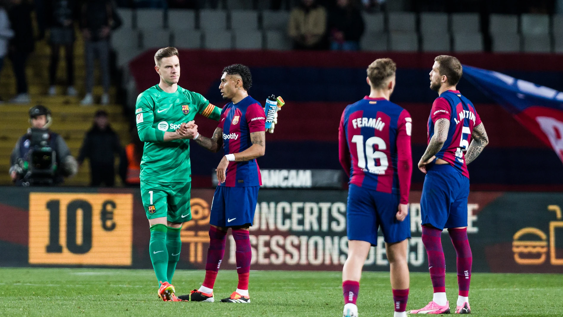 Marc-Andre ter Stegen and Raphinha Dias Belloli of FC Barcelona gestures during the Spanish league, La Liga EA Sports, football match played between FC Barcelona and Granada CF at Estadio Olimpico de Montjuic on February 12, 2024 in Barcelona, Spain. AFP7 11/02/2024 ONLY FOR USE IN SPAIN