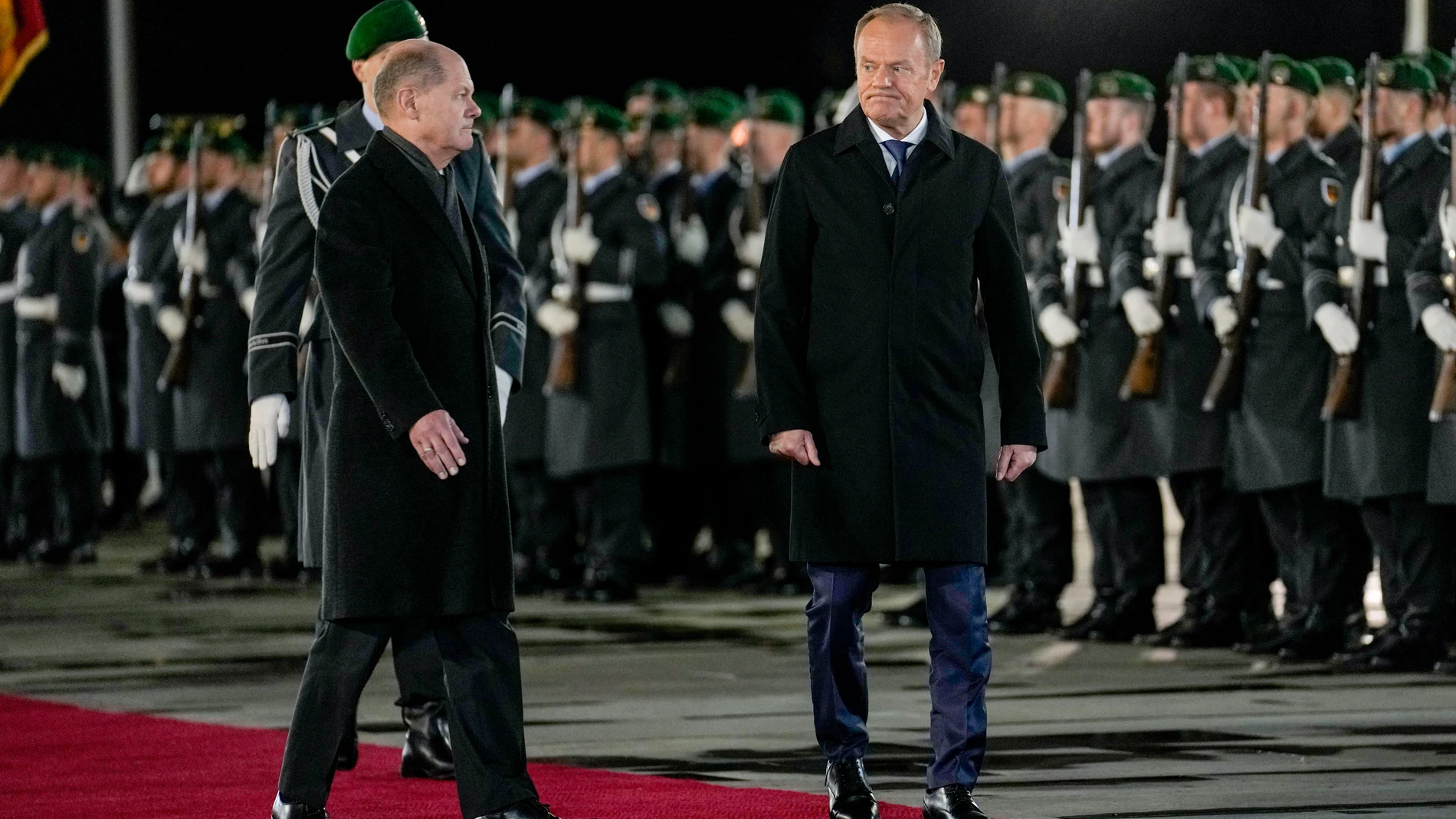 German Chancellor Olaf Scholz, left, welcomes Poland's Prime Minister Donald Tusk with military donors in Berlin, Germany, Monday, Feb.12, 2024. (AP Photo/Ebrahim Noroozi)