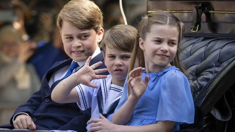 Britain's Prince George, Prince Louis and Princess Charlotte ride in a carriage on The Mall during the Platinum Jubilee celebrations for Britain's Queen Elizabeth II, in London