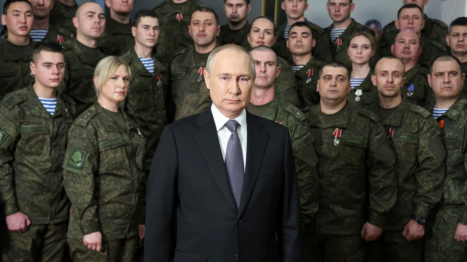 FILE - President Vladimir Putin speaks in his annual New Year's message after a visit to military officials at an unknown location in Russia, on Dec. 31, 2022. With the fighting in Ukraine entering its third year, Putin hopes to achieve his goals by biding his time and waiting for Western support for Ukraine to wither while Moscow maintains its steady military pressure along the front line. (Mikhail Klimentyev, Sputnik, Kremlin Pool Photo via AP, File)