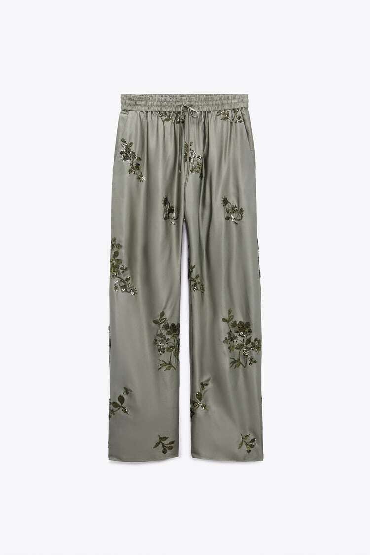 Pantalón satinado lentejuelas.