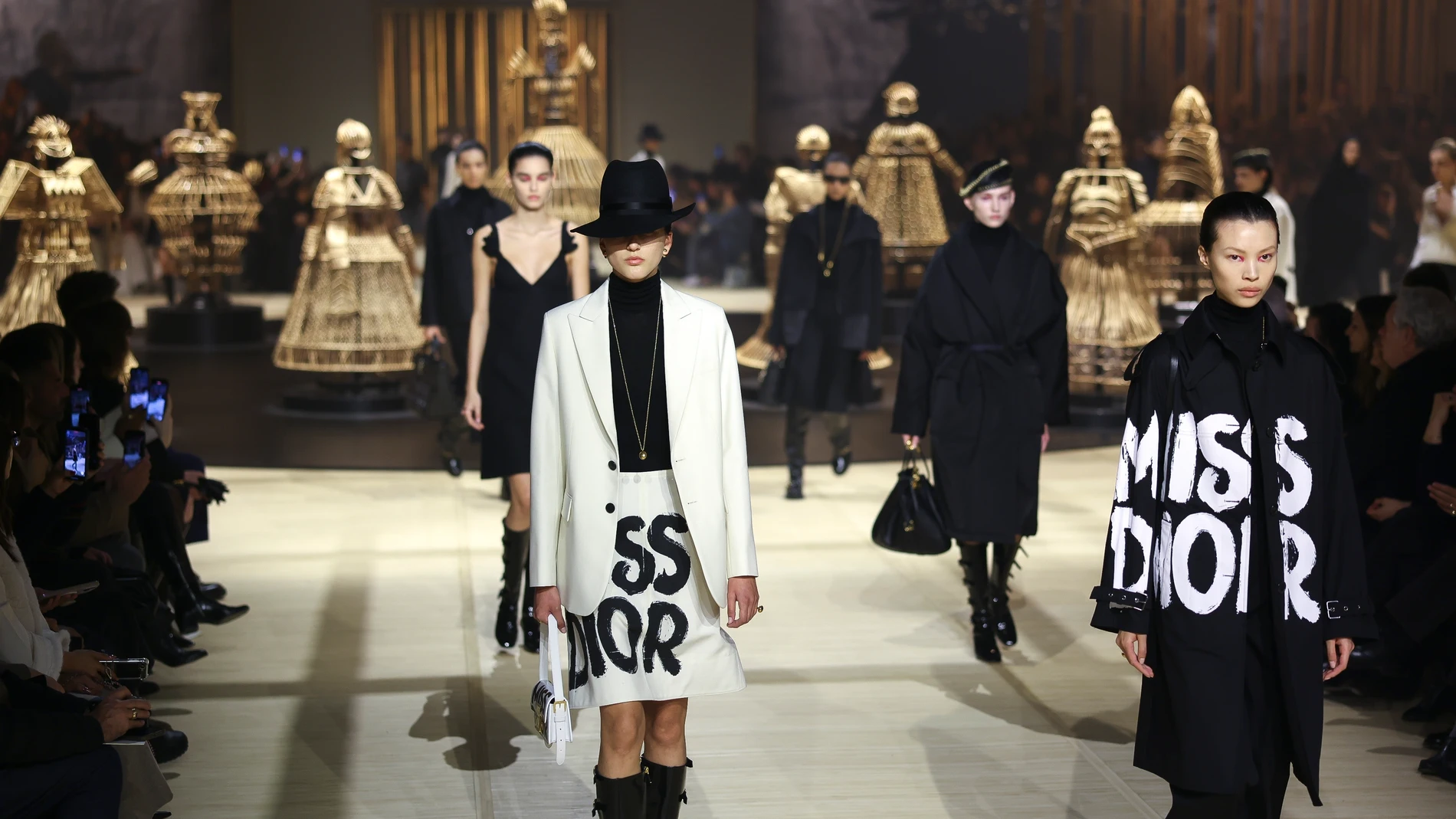 Models wear creations as part of the Christian Dior Fall/Winter 2024-2025 ready-to-wear collection presented Tuesday, Feb. 27, 2024 in Paris. (Photo by Vianney Le Caer/Invision/AP)