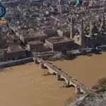 La Policía distribuye imágenes de la crecida del río Ebro a su paso por Zaragoza