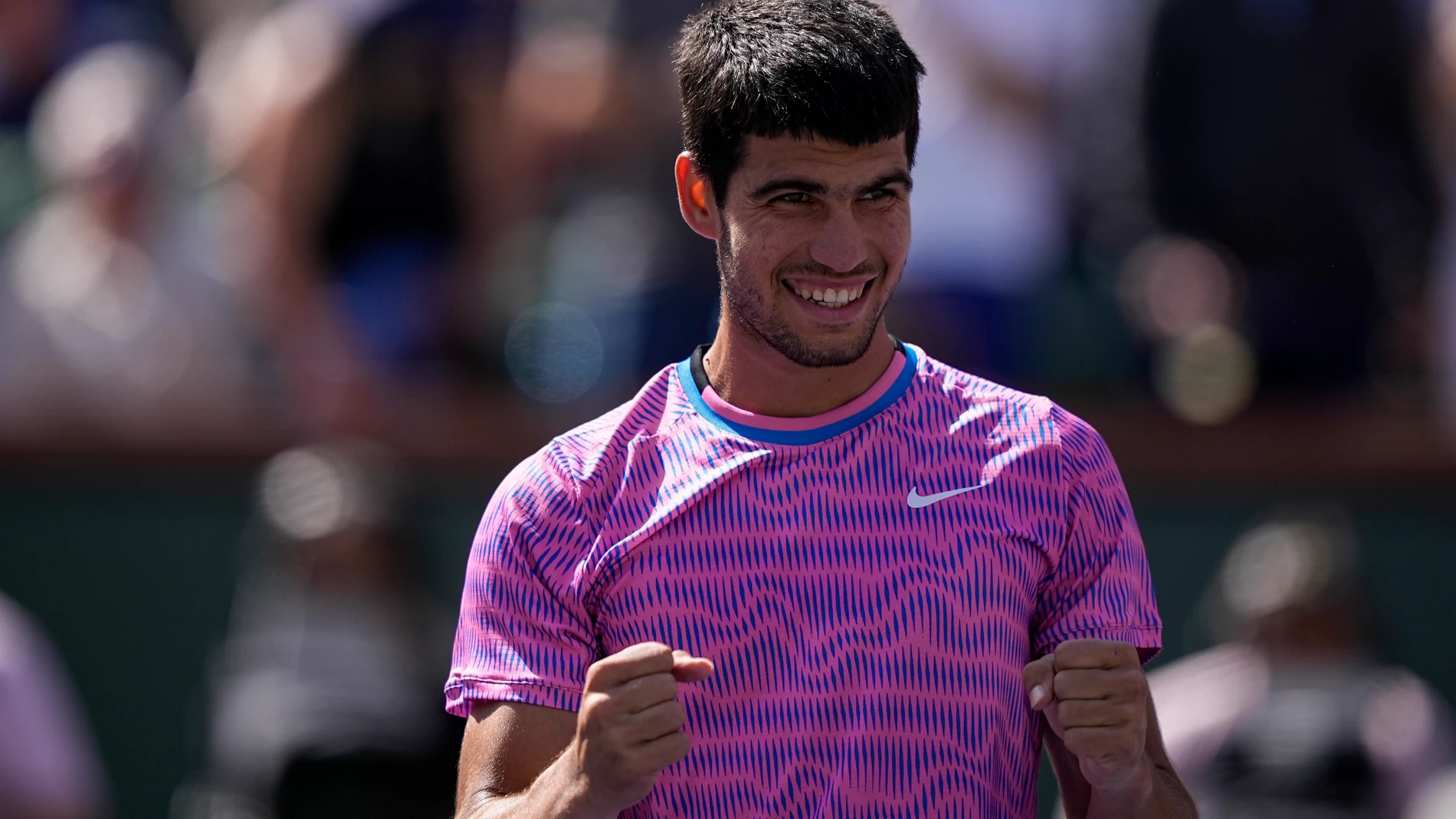 Carlos Alcaraz, of Spain, celebrates after defeating Fabian Marozsan, of Hungary, at the BNP Paribas Open tennis tournament Tuesday, March 12, 2024, in Indian Wells, Calif. (AP Photo/Mark J. Terrill)
