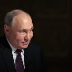  Russian President Vladimir Putin attends an interview with Rossiya Segodnya International Media Group Director General Dmitry Kiselev at the Kremlin in Moscow, Russia,