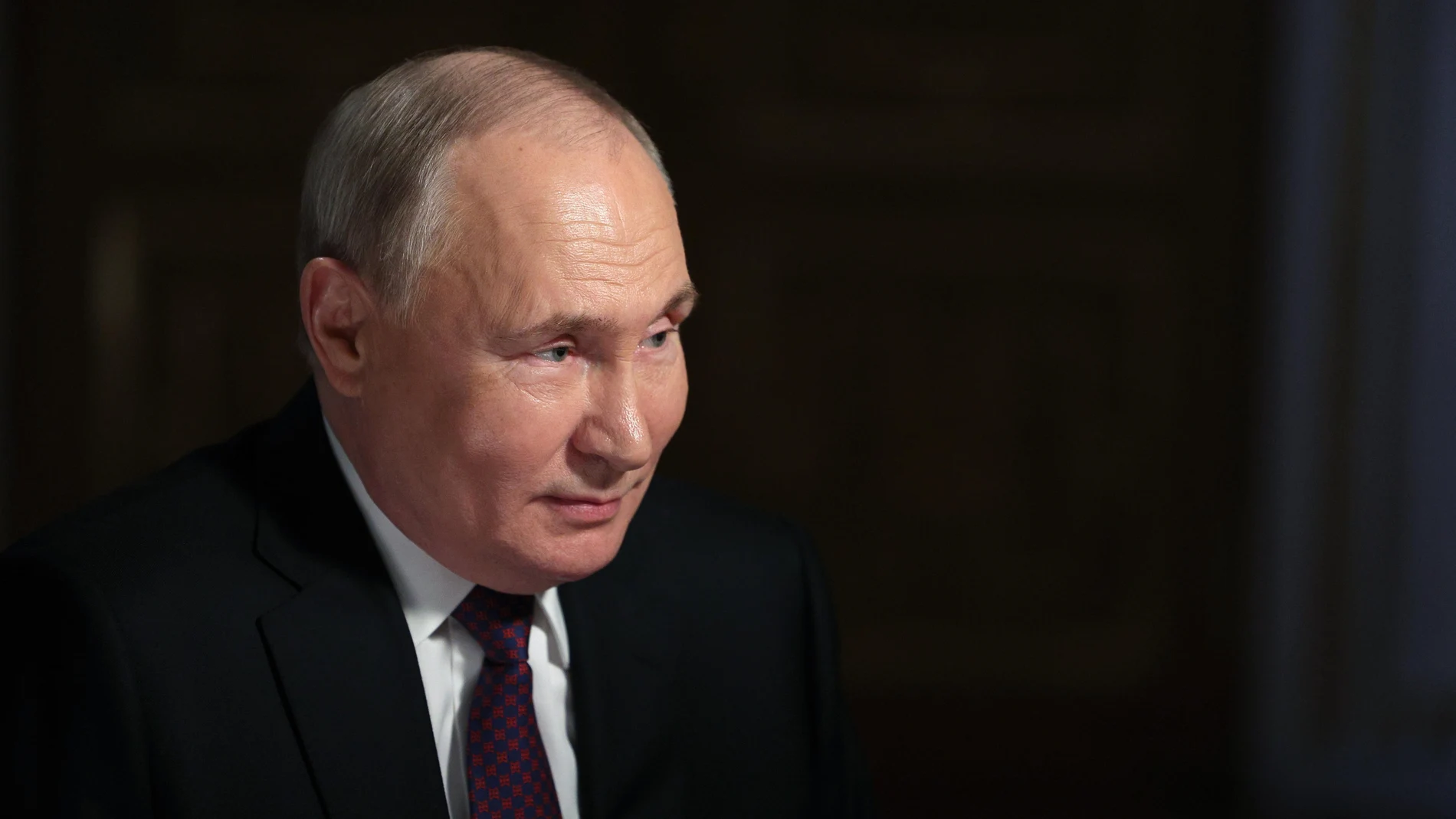Russian President Vladimir Putin attends an interview with Rossiya Segodnya International Media Group Director General Dmitry Kiselev at the Kremlin in Moscow, Russia,
