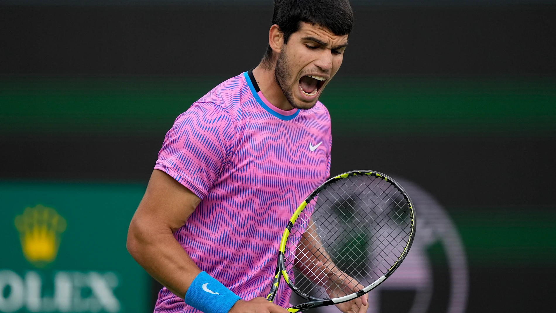 Carlos Alcaraz, of Spain, celebrates winning a point against Jannik Sinner, of Italy, during a semifinal match at the BNP Paribas Open tennis tournament, Saturday, March 16, 2024, in Indian Wells, Calif. (AP Photo/Mark J. Terrill)