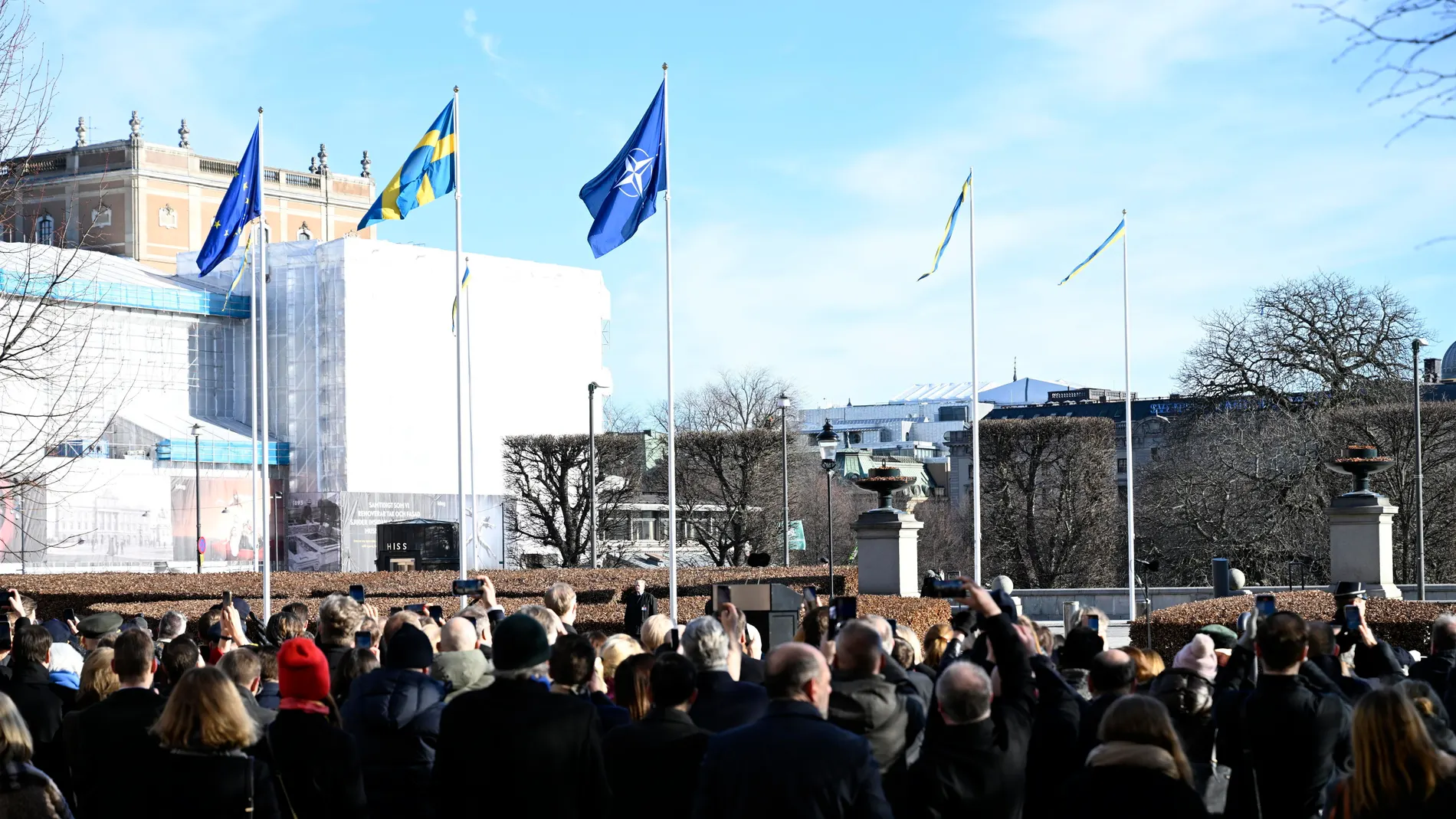 Stockholm (Sweden), 18/03/2024.- (L-R) EU, Sweden and NATO's flags are seen during a flag raising ceremony outside the Swedish Parliament Riksdag to mark Sweden's entry into NATO, in Stockholm, Sweden, 18 March 2024. Sweden formally joined NATO as the 32nd Ally on 07 March. (Suecia, Estocolmo) EFE/EPA/Pontus Lundahl SWEDEN OUT