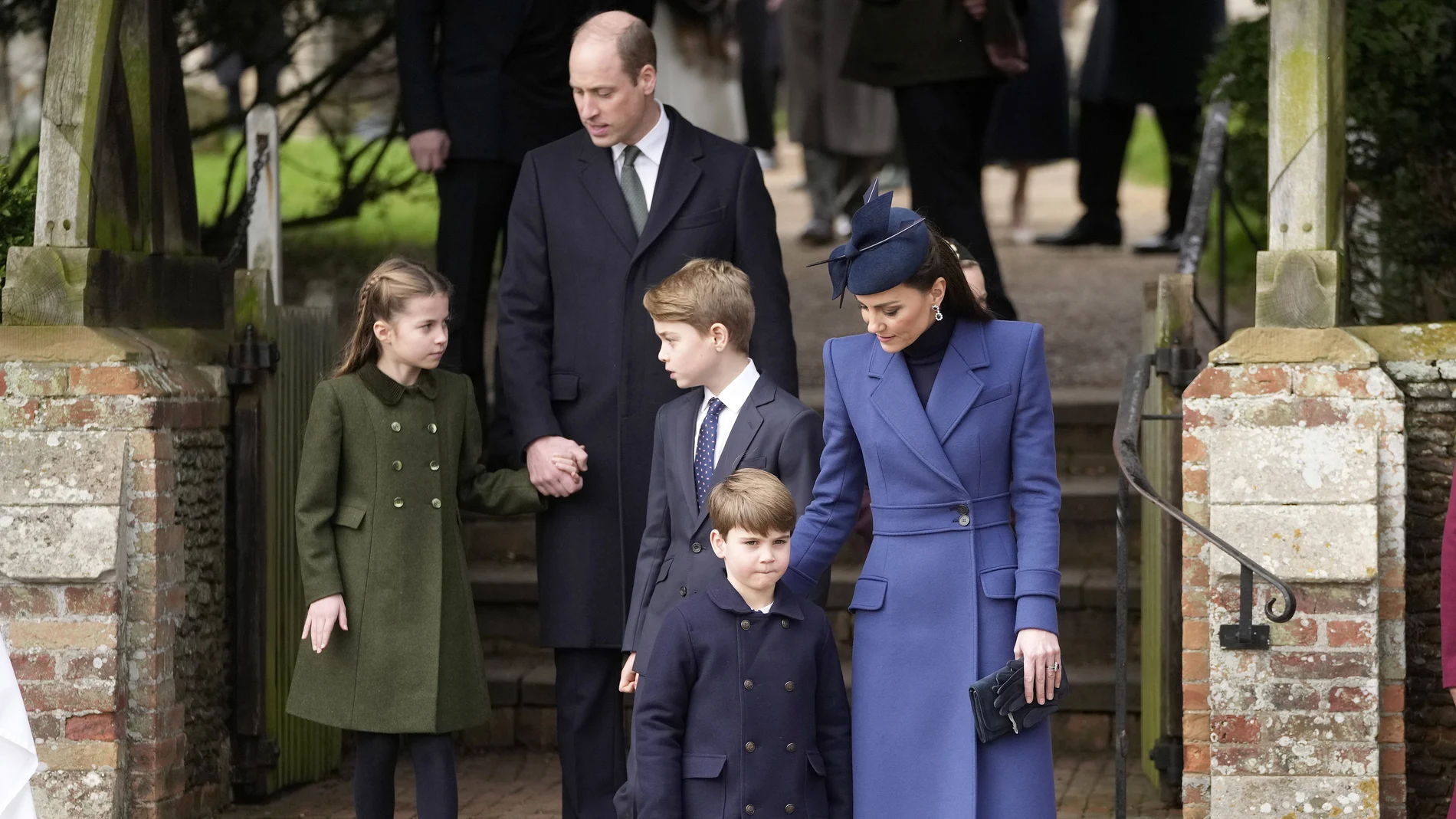 Britain's Kate, the Princess of Wales, from right, Prince Louis, Prince George, Prince William and Princess Charlotte leave after attending the Christmas day service at St Mary Magdalene Church in Sandringham in Norfolk, England