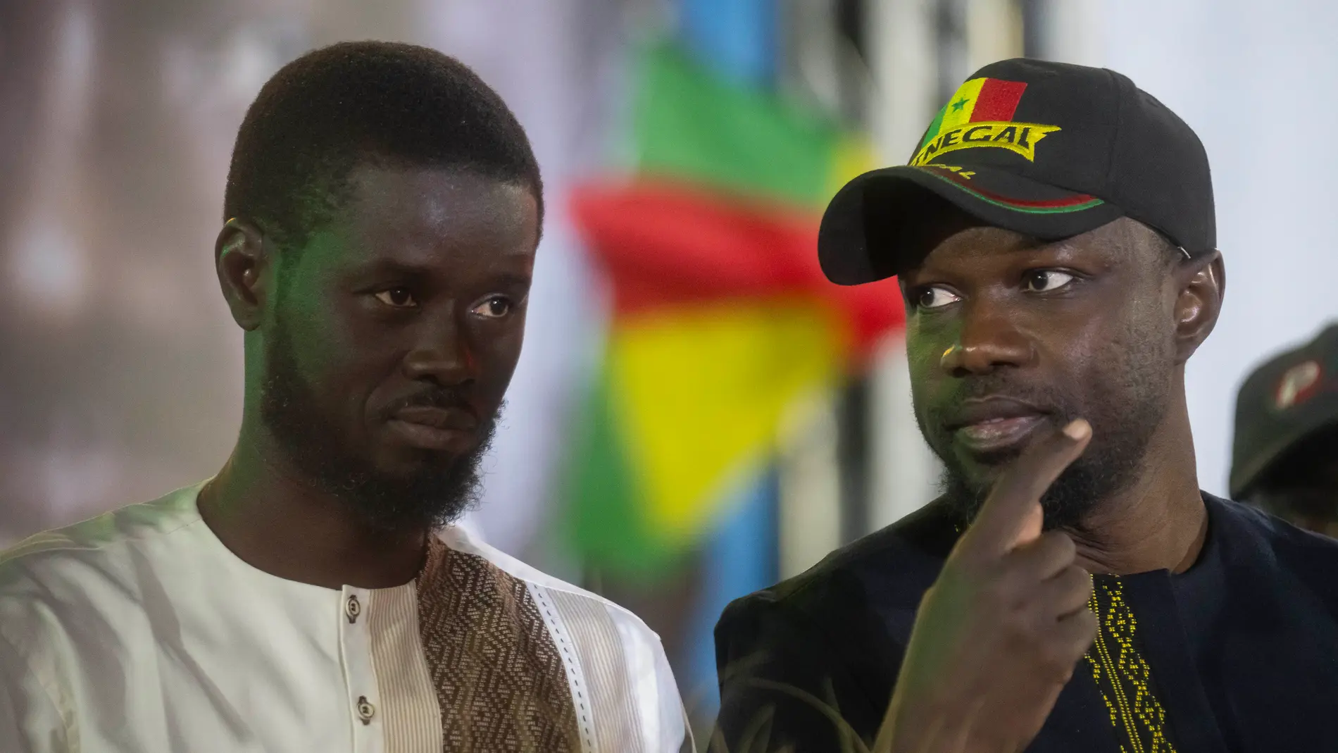 Presidential candidate Bassirou Diomaye Faye, left, and Senegal's top opposition leader, Ousmane Sonko, attend a final campaign rally ahead of the presidential elections in Mbour, Senegal, Friday, March 22, 2024. (AP Photo/Mosa'ab Elshamy)