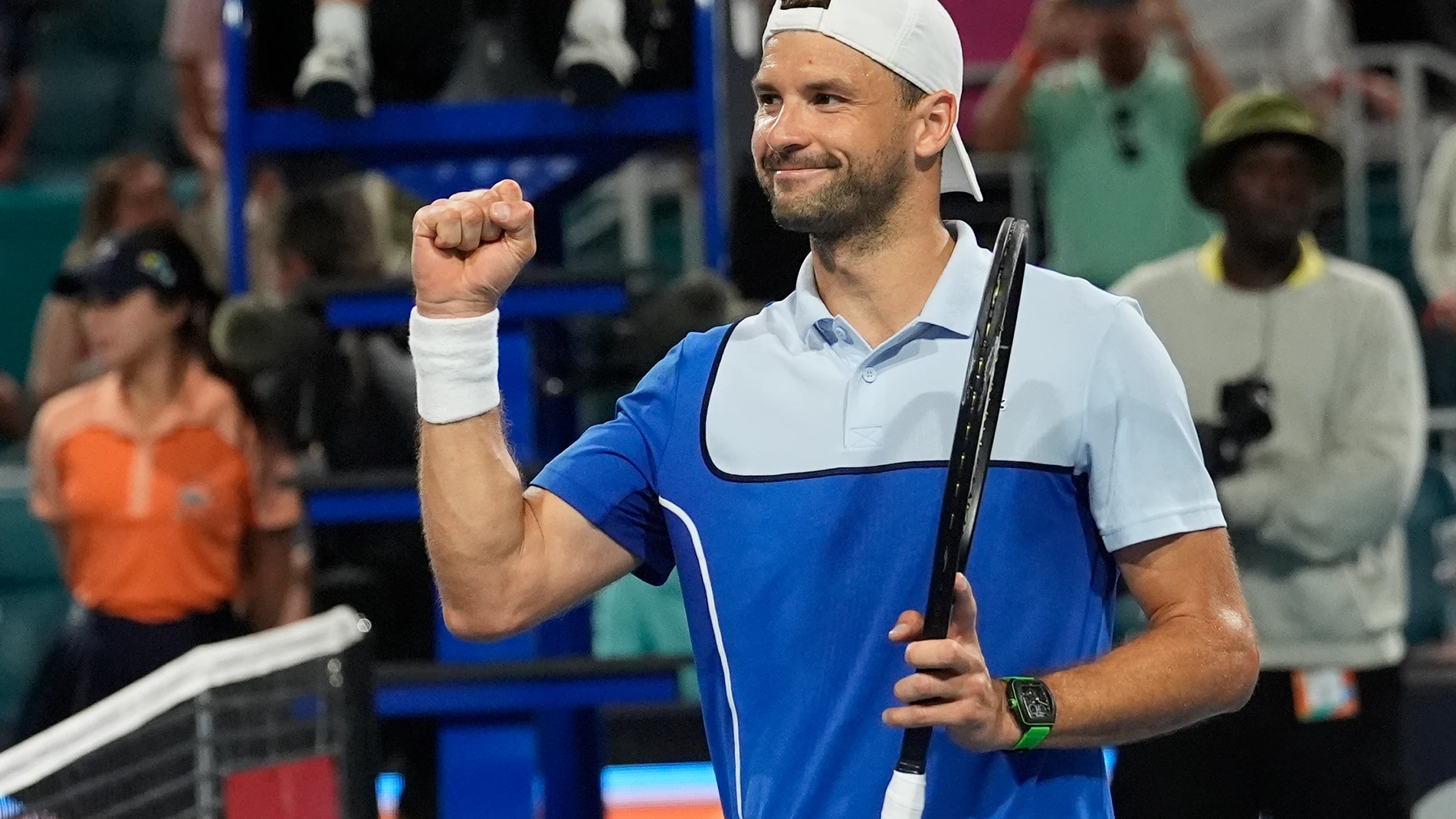 Grigor Dimitrov, of Bulgaria, celebrates after defeating Alexander Zverev, of Germany, in the semifinals of the Miami Open tennis tournament, Friday, March 29, 2024, in Miami Gardens, Fla. (AP Photo/Marta Lavandier)