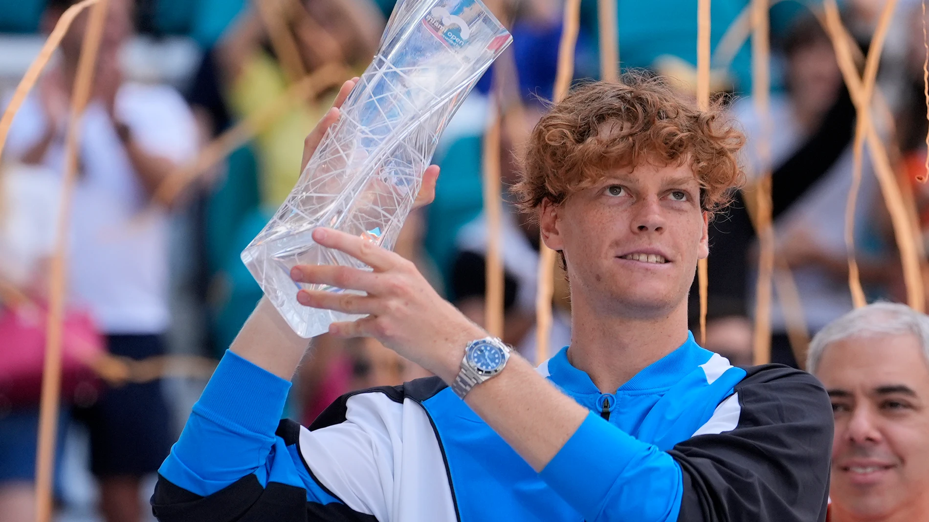 Jannik Sinner, of Italy, holds the Butch Buchholz trophy after winning the men's singles final at the Miami Open tennis tournament against Grigor Dimitrov, of Bulgaria, Sunday, March 31, 2024, in Miami Gardens, Fla. (AP Photo/Lynne Sladky)