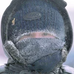 A small boy protects his face frome extreme cold in Novosibirsk.