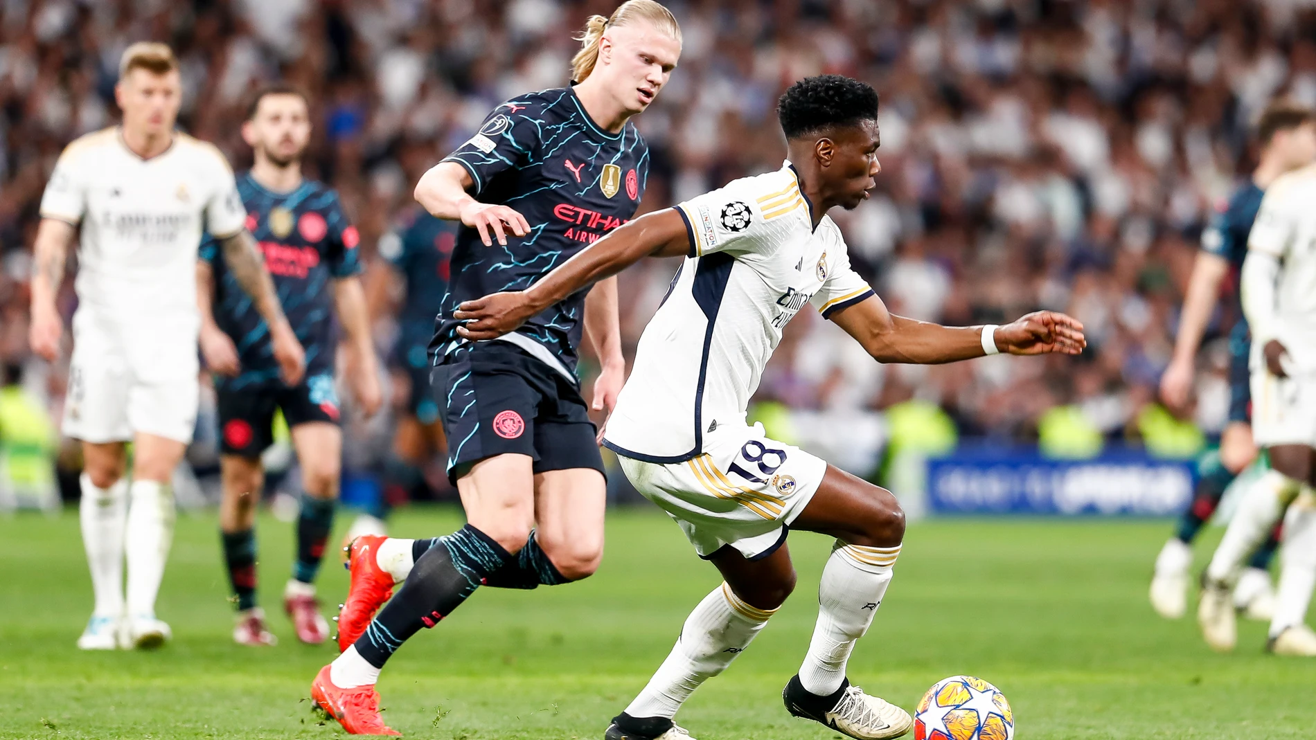Erling Haaland of Manchester City and Aurelien Tchouameni of Real Madrid in action during the UEFA Champions League, Quarter finals, football match played between Real Madrid and Manchester City at Santiago Bernabeu stadium on April 9, 2024, in Madrid, Spain. AFP7 09/04/2024 ONLY FOR USE IN SPAIN