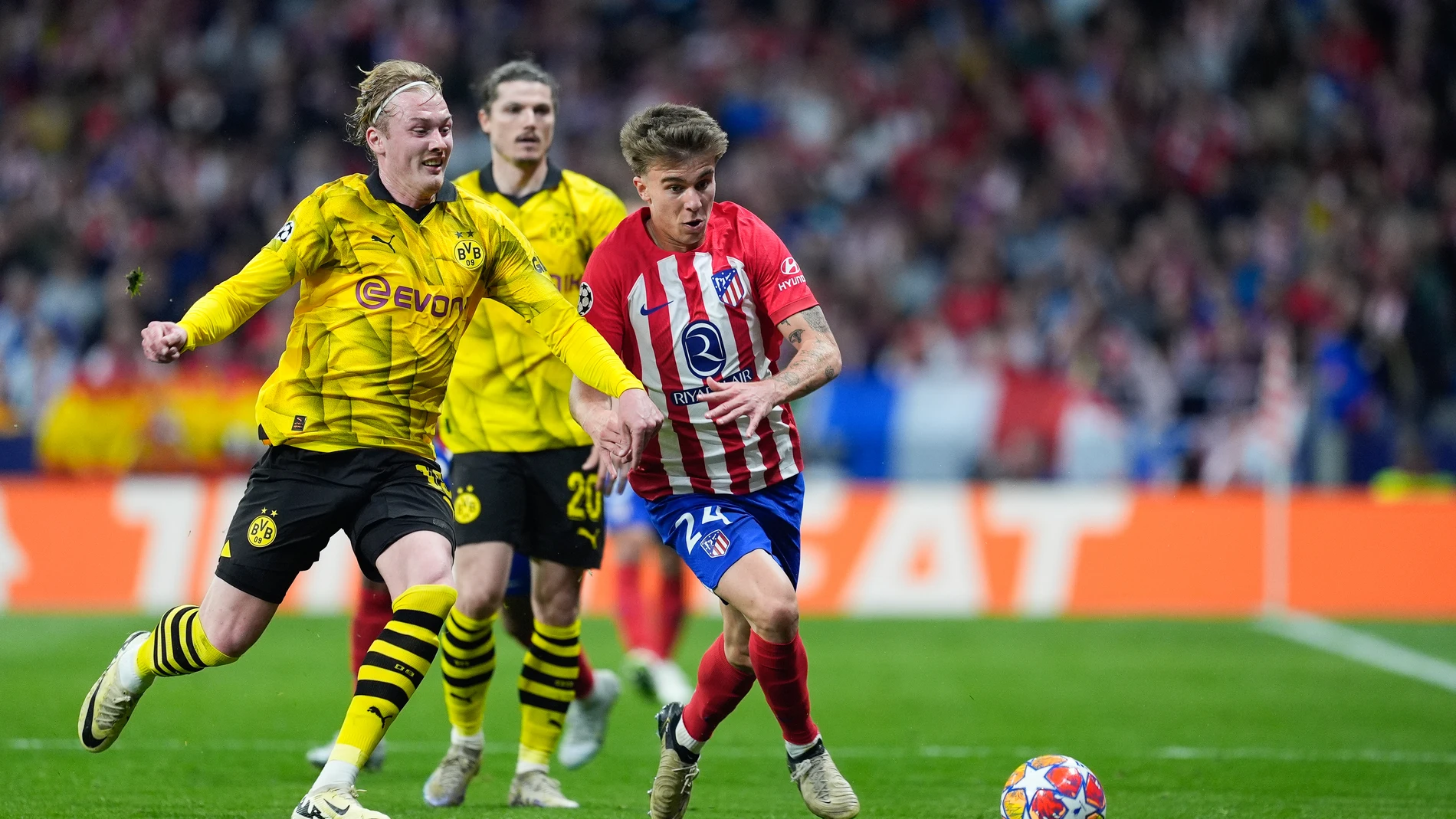 Pablo Barrios of Atletico de Madrid and Julian Brandt of Borussia Dortmund in action during the UEFA Champions League, Quarter finals, football match played between Atletico de Madrid and Borussia Dortmund at Civitas Metropolitano stadium on April 10, 2024, in Madrid, Spain. AFP7 10/04/2024 ONLY FOR USE IN SPAIN
