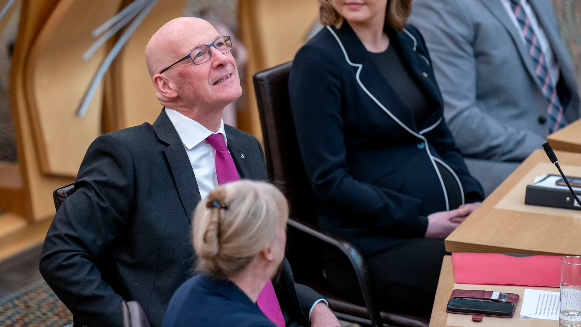 John Swinney in the main chamber after being voted in as First Minister at the Scottish Parliament in Edinburgh, Tuesday May 7, 2024. (Jane Barlow/PA via AP)