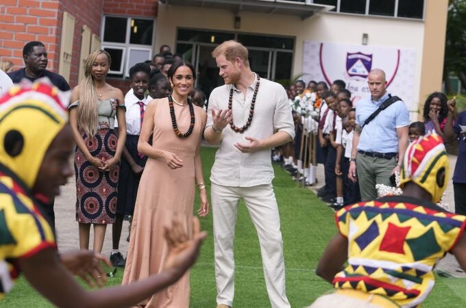 Prince Harry and Meghan visit children at the Lights Academy in Abuja, Nigeria, Friday, May 10, 2024. Prince Harry and his wife Meghan have arrived in Nigeria to champion the Invictus Games, which he founded to aid the rehabilitation of wounded and sick servicemembers and veterans.