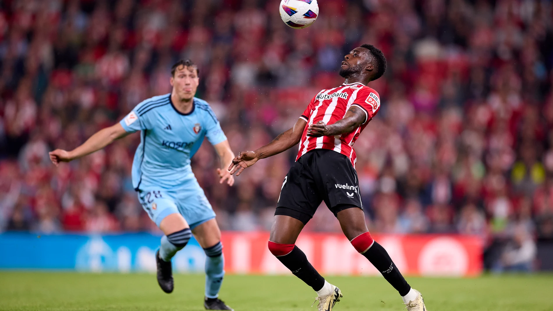 Inaki Williams of Athletic Club competes for the ball with Jorge Herrando of CA Osasuna during the LaLiga EA Sports match between Athletic Club and CA Osasuna at San Mames on May 11, 2024, in Bilbao, Spain. AFP7 11/05/2024 ONLY FOR USE IN SPAIN