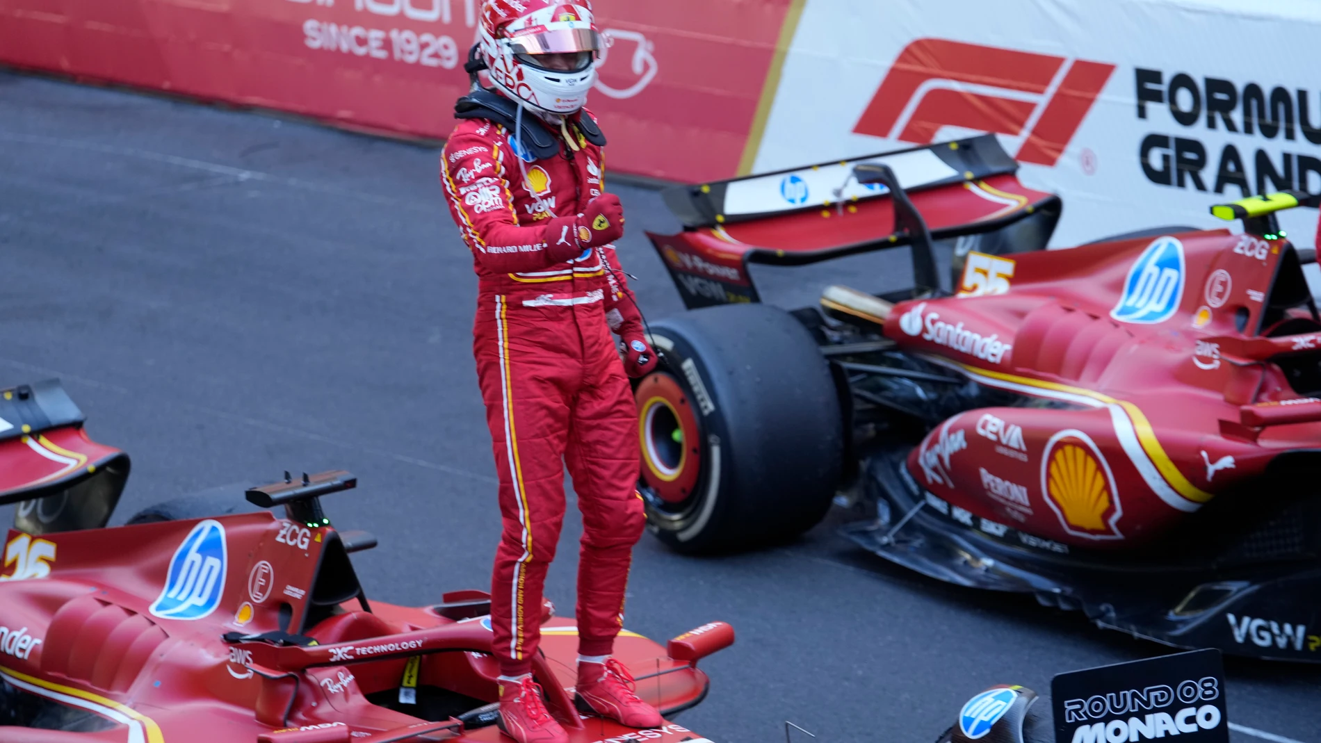 Ferrari driver Charles Leclerc of Monaco celebrates after winning the Formula One Monaco Grand Prix race at the Monaco racetrack, in Monaco, Sunday, May 26, 2024. (AP Photo/Luca Bruno)